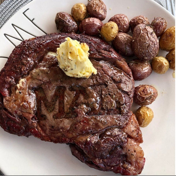 Customer Photo of a Branded Steak with Butter.