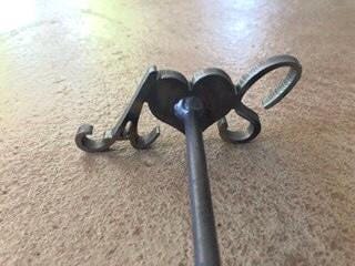 Close up Branding Iron - First initial with a heart in the center and then the last initial. 12" long. For anniversaries, weddings, and BBQ