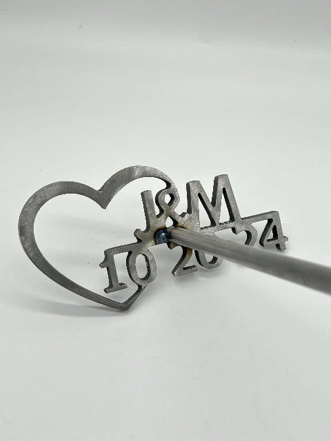 Wedding Branding Iron with initials and & symbol in the middle. The date is below. The heart is on the left.