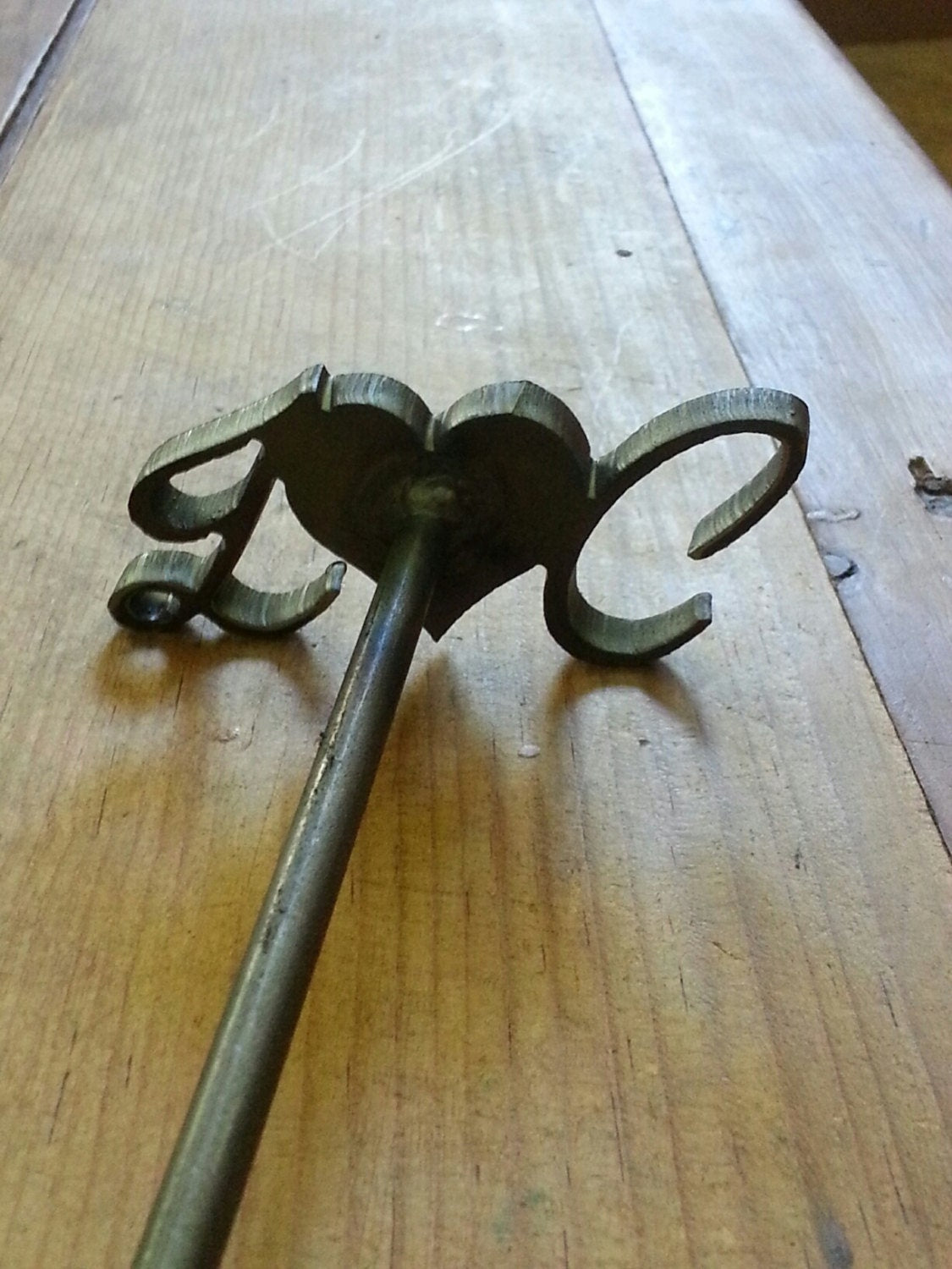 Close up Branding Iron - First initial with a heart in the center and then the last initial. 12" long. For anniversaries, weddings, and BBQ