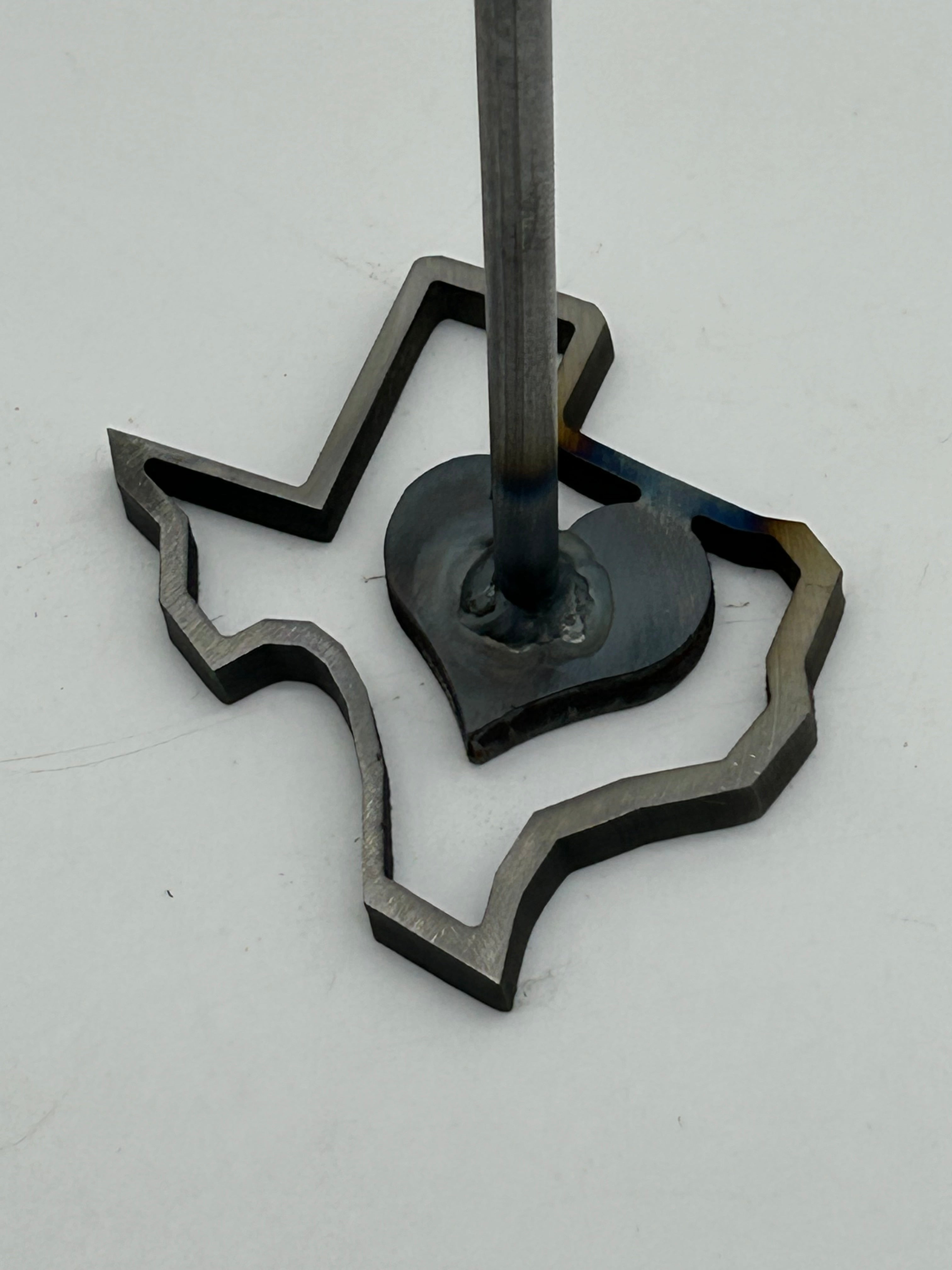Close Up view of text Branding iron