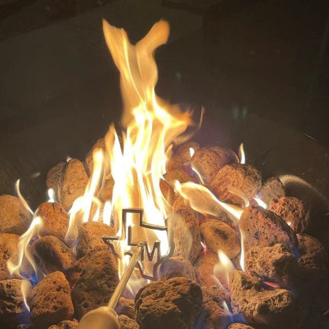 Custom Texas BBQ Branding Iron in firepit for BBQ